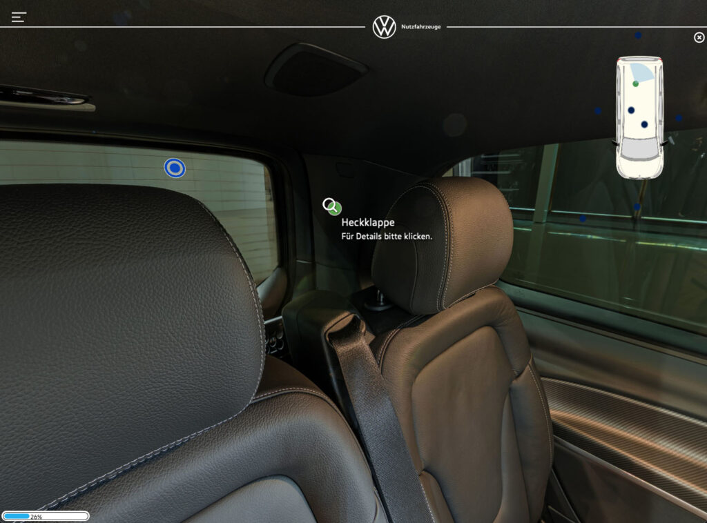 Rear view of Ford competitor vehicle with hatchback info point and 26 percent progress indicator in immersive VW Multivan training.